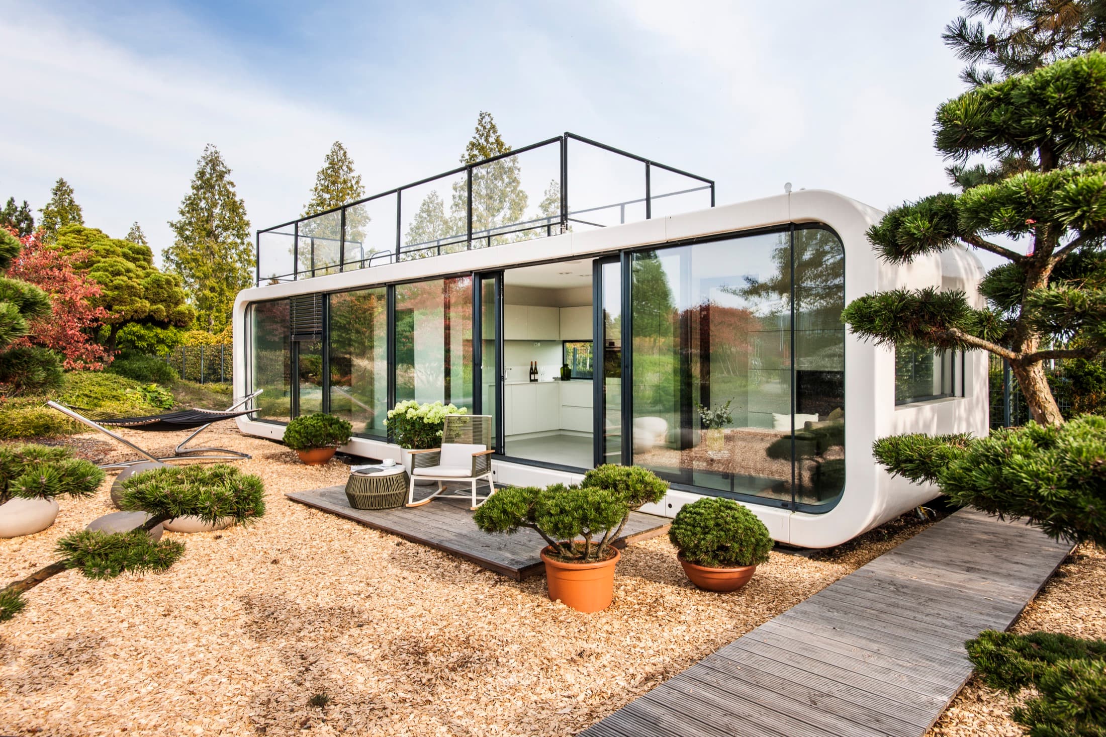 Inguestor team member beside a modular hospitality unit